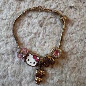 Sanrio Hello Kitty Gold Tone Bracelet with Pink Accents